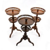 A SET OF FOUR ROUND ETAGERES