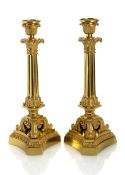 A pair of Louis Philippe ormolu candlesticks