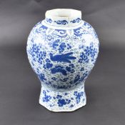 A LARGE DELFT BLUE AND WHITE FAYENCE VASE