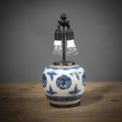 A BLUE AND WHITE STYLIZED PHOENIX PORCELAIN VASE MOUNTED AS A LAMP
