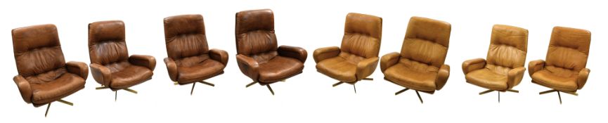 Set of eight rotatable leather armchairs