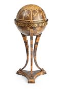 An empire style walnut fruitwood tulipwood satinwood mahogany and others marquetry globe table