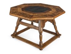 A Swiss walnut, maple, burr birch and slate table