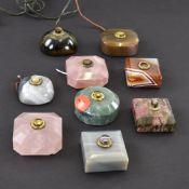 NINE METAL MOUNTED HARDSTONE TABLE BELLS