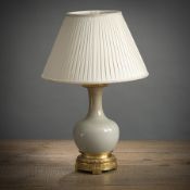 AN ORMOLU-MOUNTED CRAZED GLAZE BOTTLE VASE MOUNTED AS A LAMP