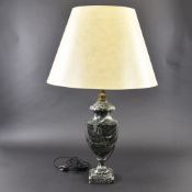 A GREEN MARBLE TABLE LAMP