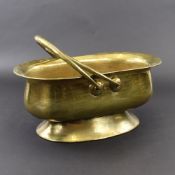 A BRASS CHIMNEY BASKET