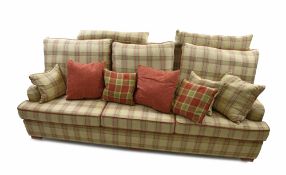 Large sofa with checkered cover