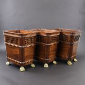 A set of three gilt brass mounted mahogany buckets