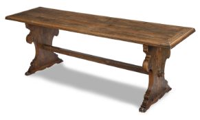 An Italian walnut center table
