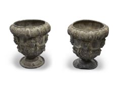 A pair of English lead garden vases
