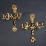 A PAIR OF TWO LIGHT PATINATED AN GILT BRONZE WALL LIGHTS