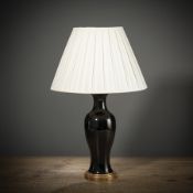 A 'Mirror Black' porcelain vase with remnants of gold painting, electrified as a table lamp