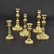 THREE PAIRS OF GILT BRONZE CANDLESTICKS