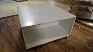 White Display Unit On Wheels