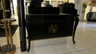 Vegan Beauty Black Wood Display Table With Red Top