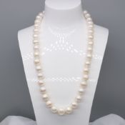 Hand-strung and knotted cultured pearl strung necklace