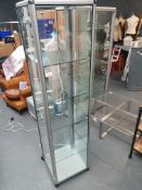 Glass Display Cabinet On Castors With Lights