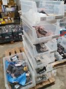 7 x tubs with 50+ items; door handles, lock sets, shock absorber kits, etc