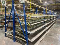 A Run Of 10 Bays Of Back To Back Flow Racks
