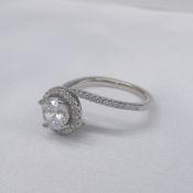 Silver cubic zirconia halo and twist dress ring