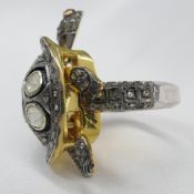 Distinctive 1.30 carat diamond and ruby tortoise r