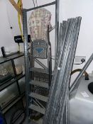 Dismantled Metal Shelving and Step Ladder