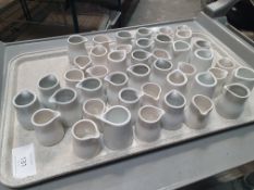 40+ milk jugs