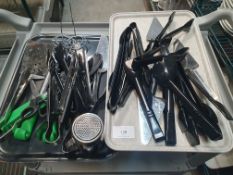 selection of utentils; spoons, tongs, etc