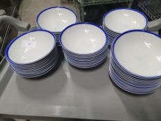50+ white bowls, blue rim