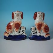 Pair Staffordshire Pottery Seated Russet Spaniels With Pups