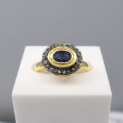 Oval Sapphire & Diamond Halo Ring