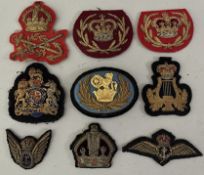 A QUANTITY OF MILITARY AND NAVAL EMBROIDERED AND CLOTH BADGES