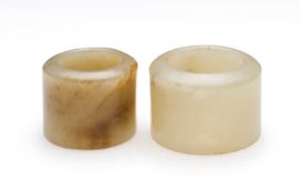 □ TWO CHINESE JADE ARCHERS RINGS, QING DYNASTY, 19TH CENTURY