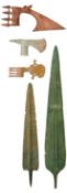A COPPER ALLOY SPEARHEAD, POSSIBLY LURISTAN CIRCA 1300-900 B.C., ANOTHER, LATER, AND THREE AXE