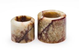 □ TWO CHINESE JADE ARCHERS RINGS, QING DYNASTY, 19TH CENTURY