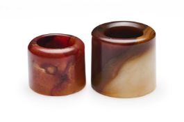 □ TWO CHINESE JADE ARCHERS RINGS, QING DYNASTY, 19TH CENTURY