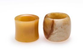 □ TWO CHINESE JADE ARCHERS RINGS, QING DYNASTY, 19TH CENTURY