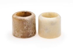 □ TWO CHINESE JADE ARCHERS RINGS, QING DYNASTY, 19TH CENTURY