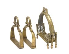 AN INDIAN COPPER ALLOY STIRRUP AND A PAIR OF INDIAN COPPER ALLOY STIRRUPS, 18TH/19TH CENTURY