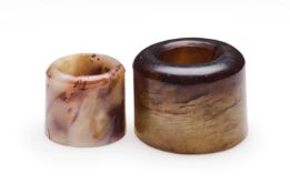 □ TWO CHINESE JADE ARCHERS RINGS, QING DYNASTY, 19TH CENTURY