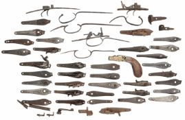 A QUANTITY OF DETACHED PERCUSSION BACK-ACTION LOCK-PLATES, SECOND HALF OF THE 19TH CENTURY
