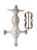 AN INDIAN HILT FOR A SWORD (TALWAR) AND AN INDIAN BELT BUCKLE, 18TH CENTURY