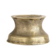 A BRASS CANDLESTICK BASE, WESTERN IRAN, CIRCA 14TH CENTURY