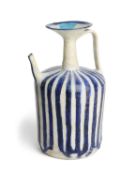 A KASHAN BLUE AND WHITE EWER, PERSIA, CIRCA 13TH CENTURY