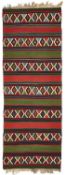 □ A CAUCASIAN KILIM, 20TH CENTURY