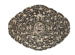 □ A PARCEL GILT SILVER BUCKLE, MALAYSIA, 19TH CENTURY