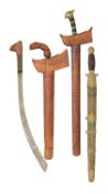 A CHINESE SWORD (DAO) AND THREE MALAYSIAN DAGGERS, LATE 19TH/EARLY 20TH CENTURY