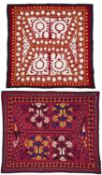 □ AN UZBEK EMBROIDERED CRADLE SPREAD, UZBEKISTAN, EARLY 20TH CENTURY