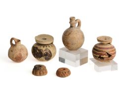□ SIX ANCIENT TERRACOTTA OBJECTS, GREECE AND CYPRUS, 1600-600 B.C.